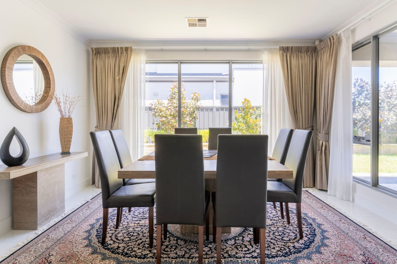 Adelaide Airbnb lounge & dining after Host Solutions styling and professional photography