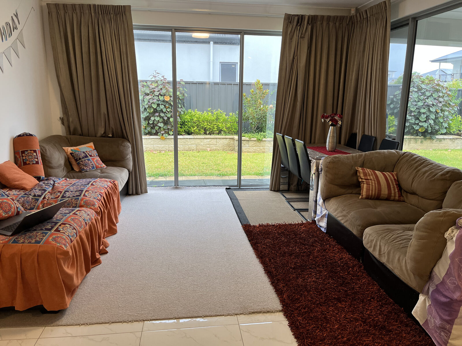 Adelaide Airbnb lounge & dining before Host Solutions styling and photography